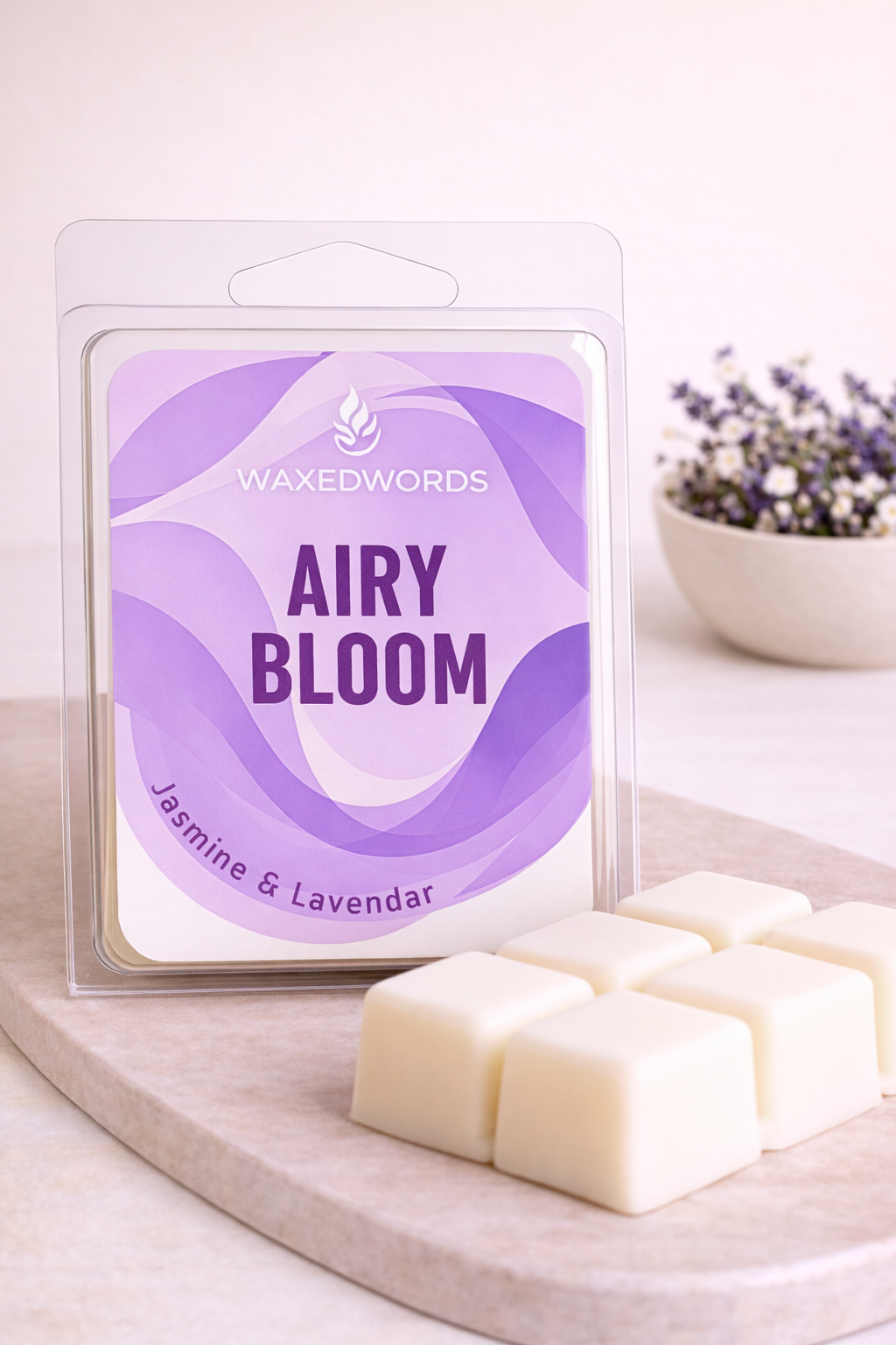 Close-up of floral wax melt cubes with soft purple label and minimalist styling