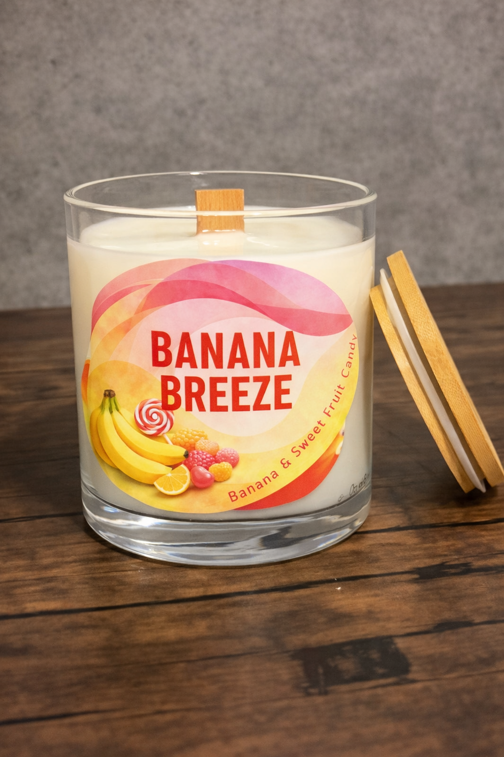 Banana Breeze 10oz glass jar candle with wooden lid and banana sweet fruit candy label