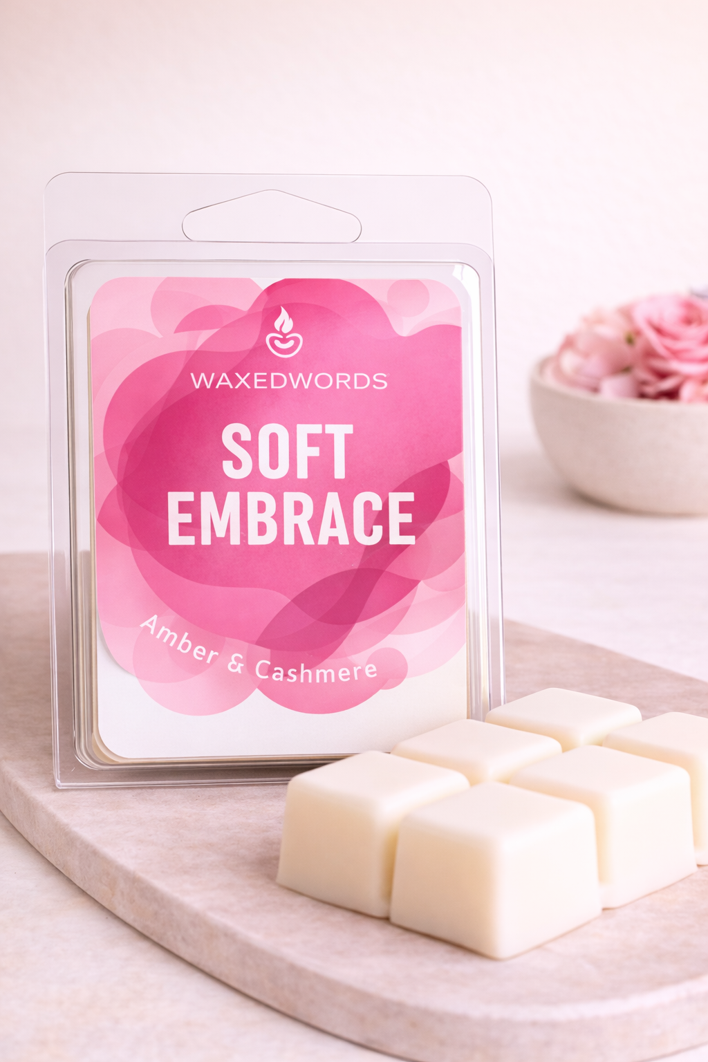 Soft Embrace wax melts with amber and cashmere scent in clamshell packaging, designed to create a warm, calming and cozy home atmosphere